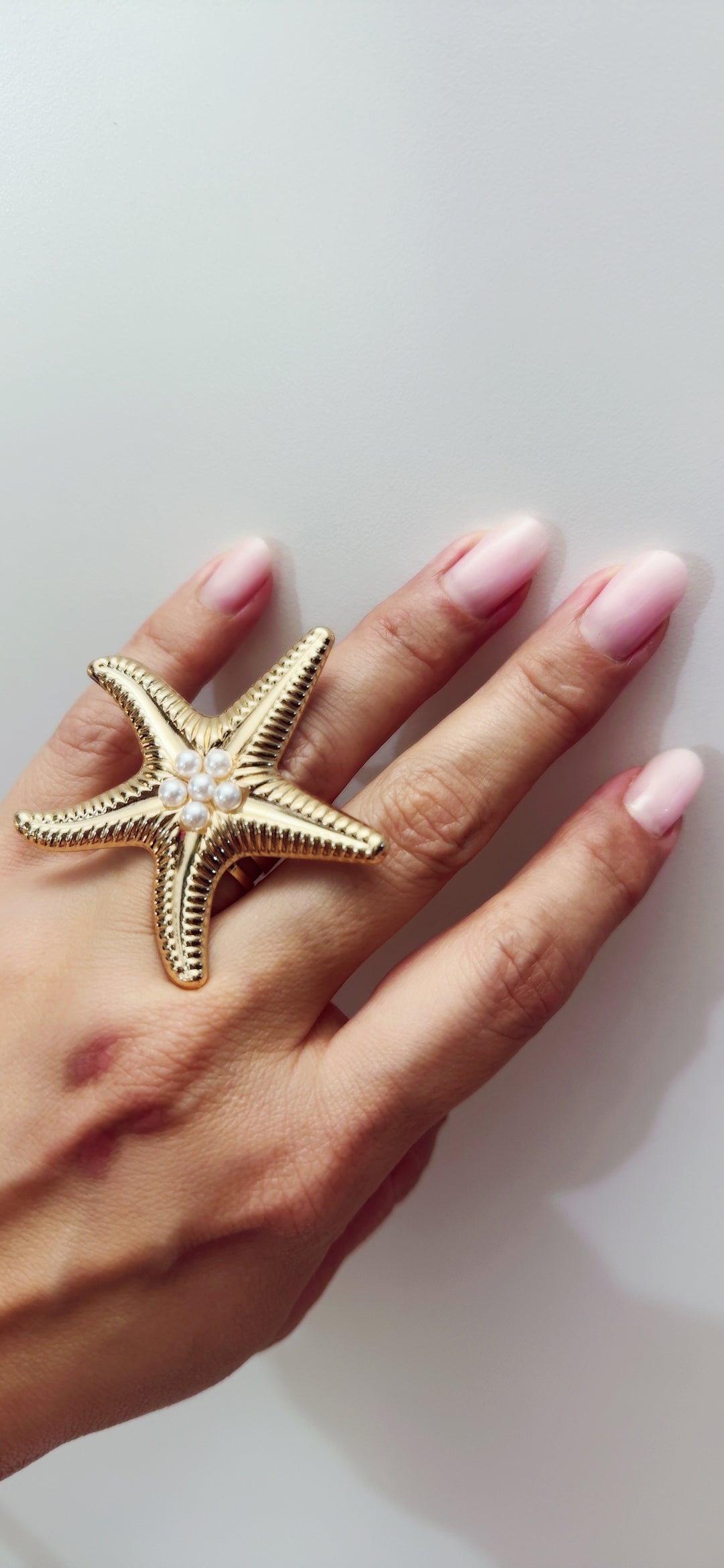 Anillo Dorado Estrella de Mar Perlas (#100)
