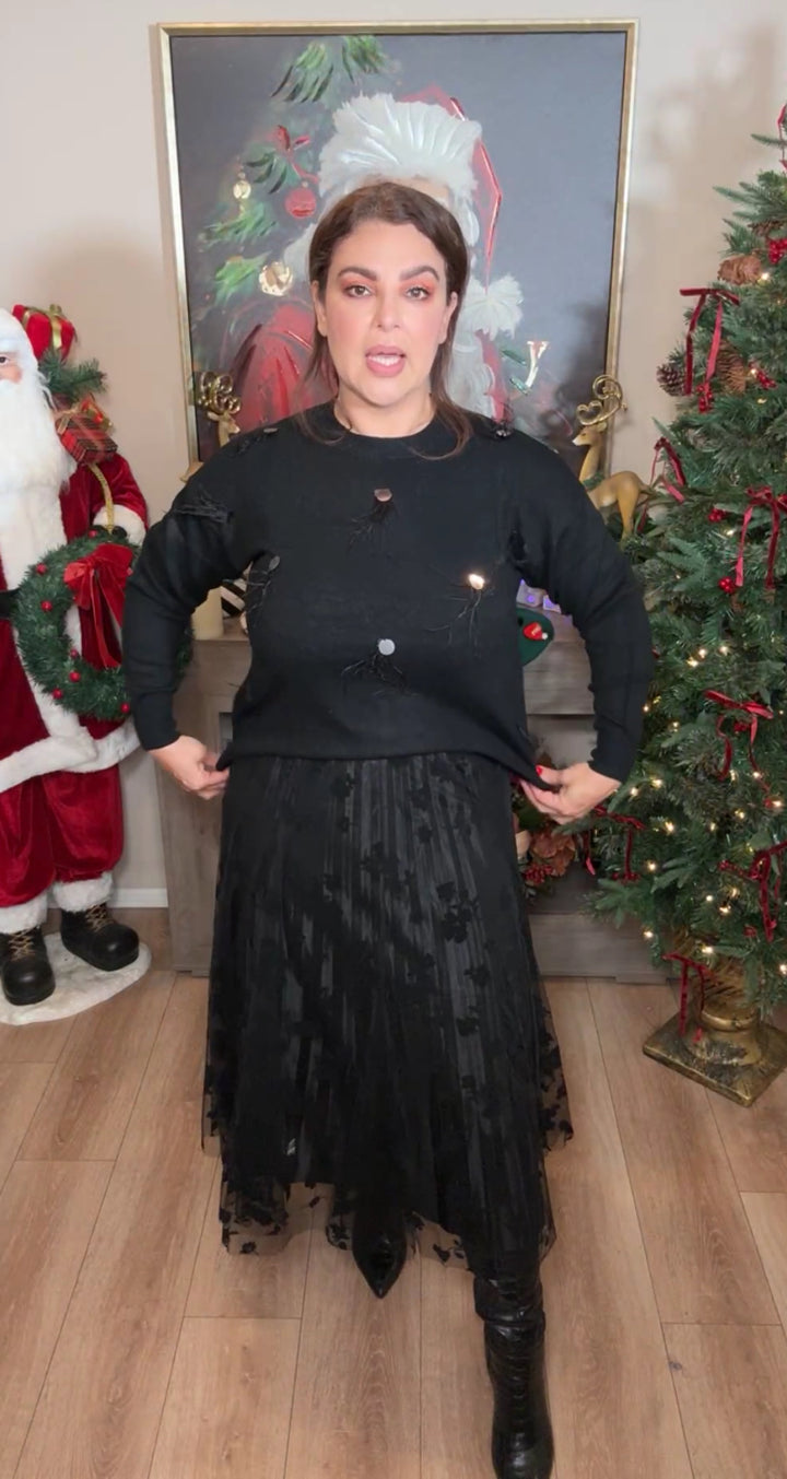 Sweater negro aplicación plumas soft (#136)