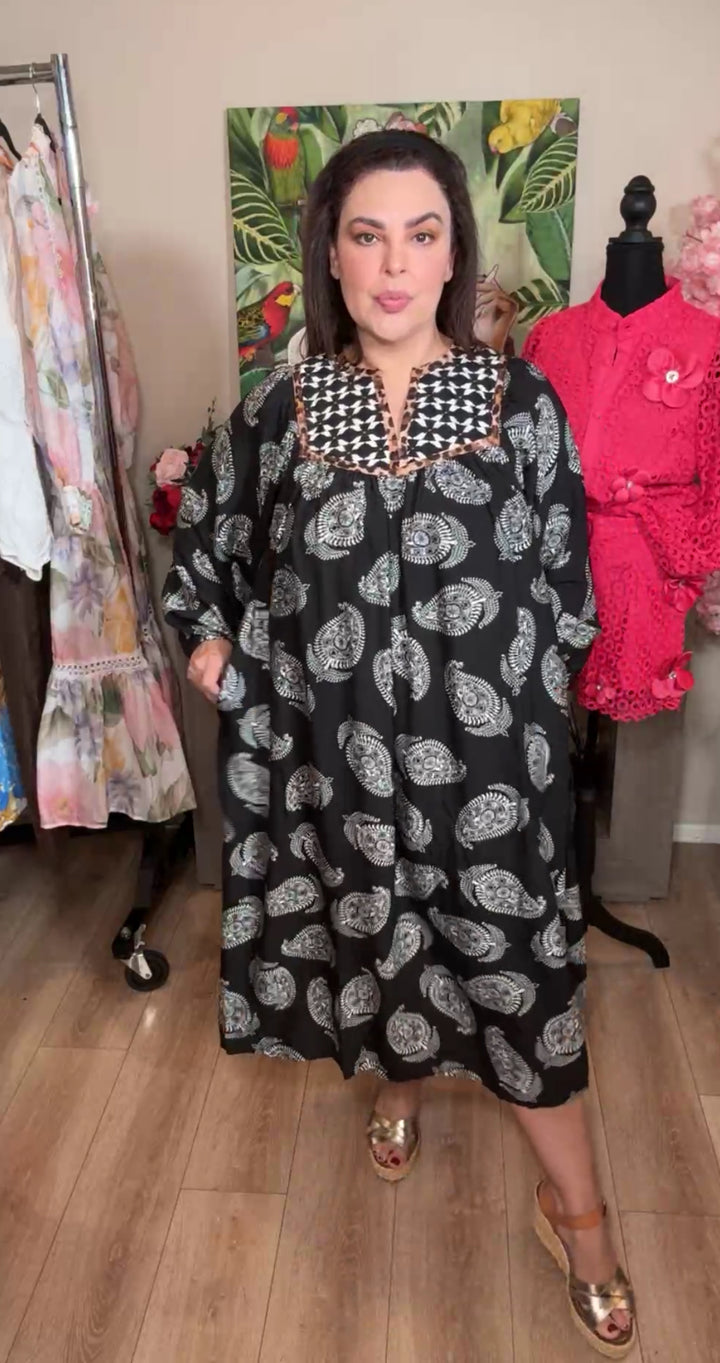 vestido negro diseño paño con franja leopardo midi relax (#144)